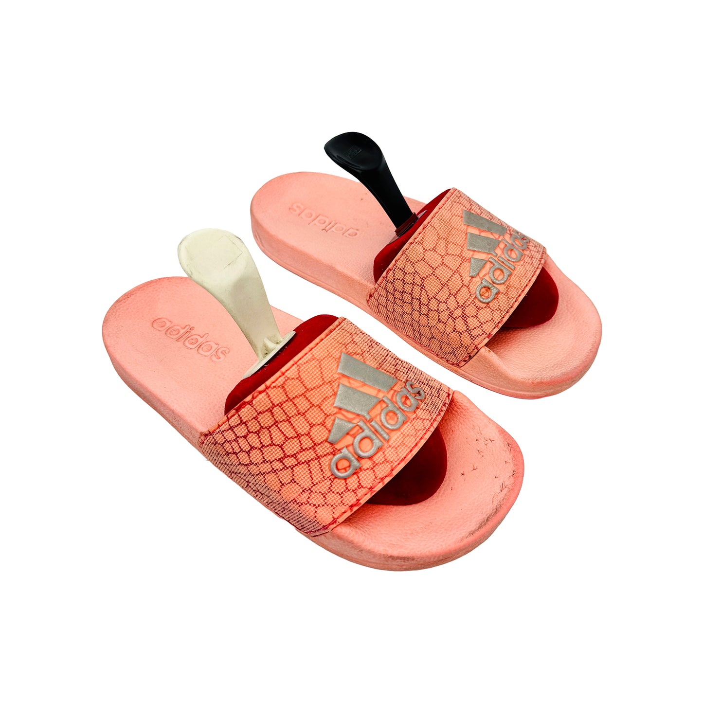 Adidas Adilette slides with a popsicle design on a white background