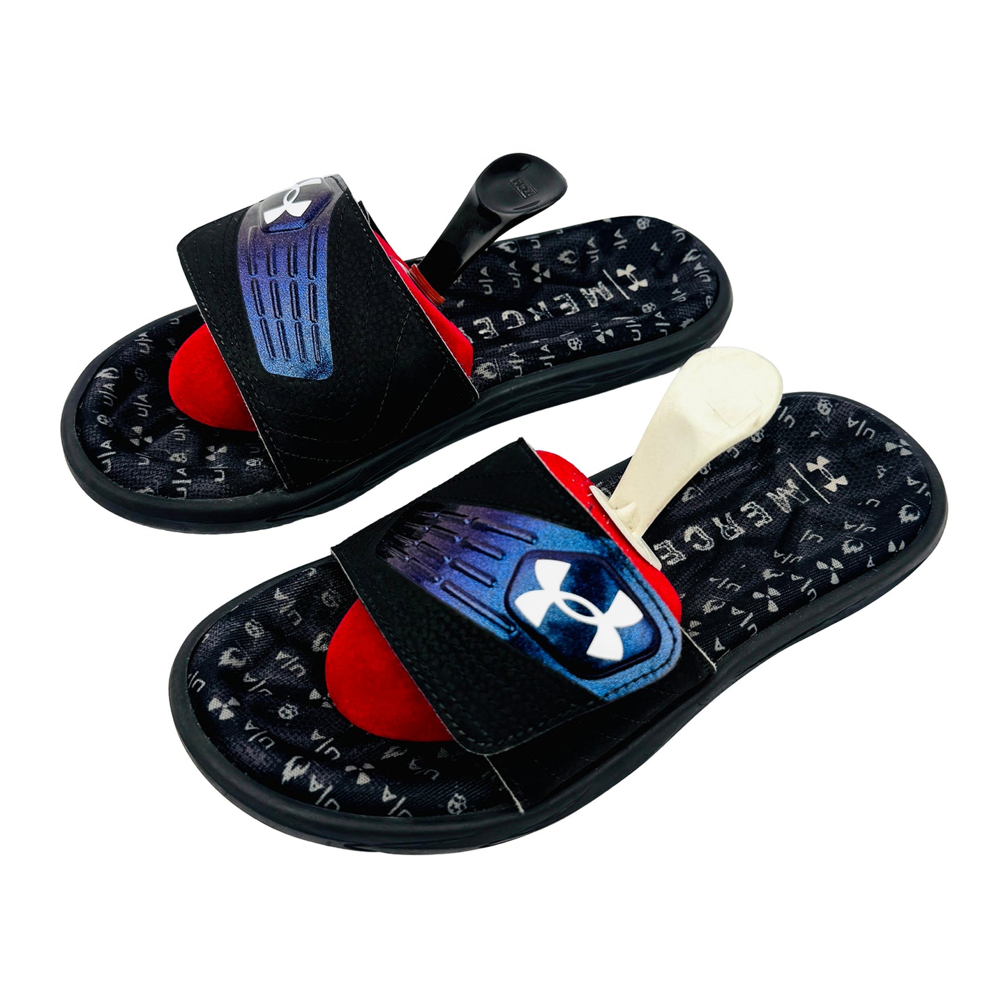 Black Under Armour slides with red filling and blue accents featuring a logo on a white background