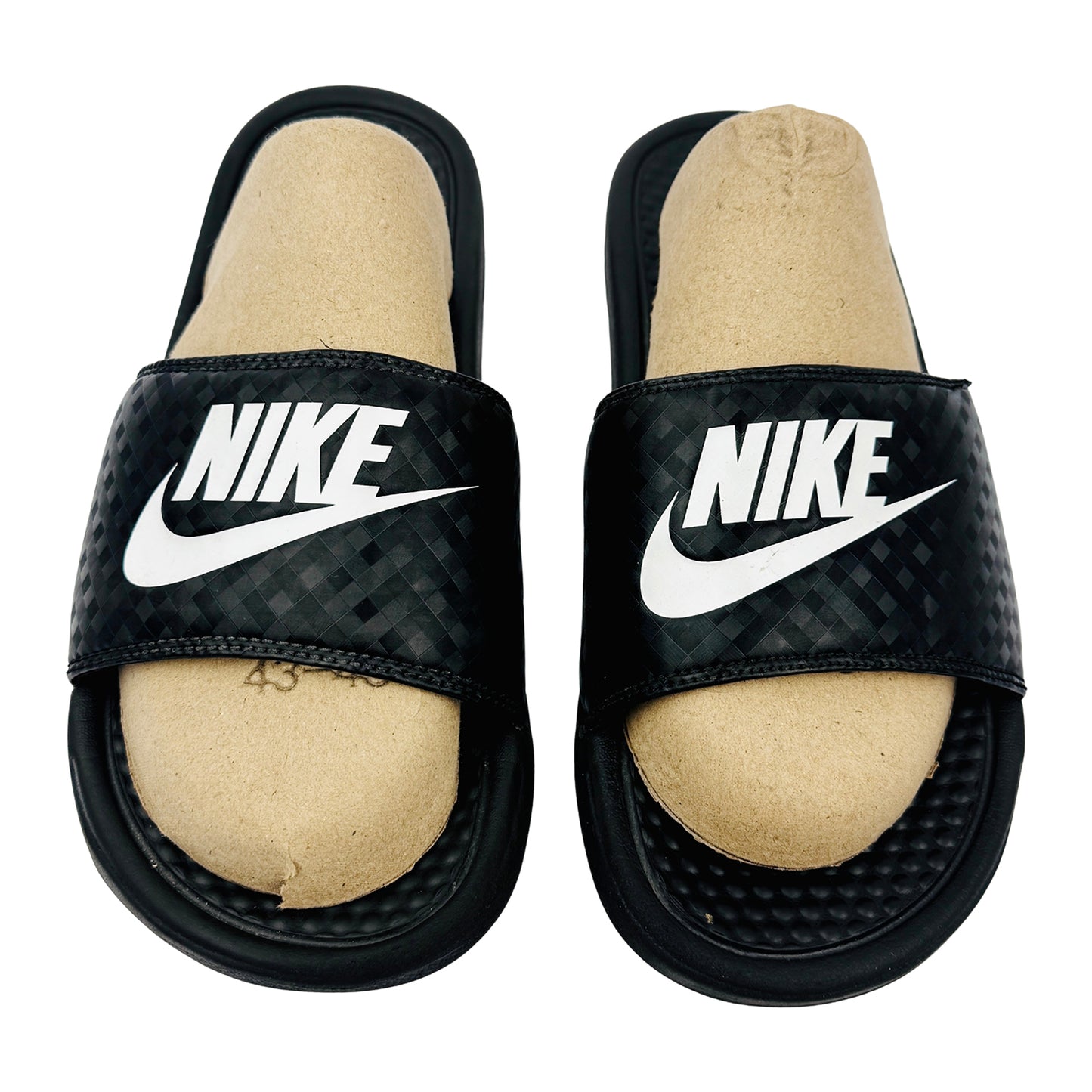 Black Nike Benassi JDI slides with tan filling on a white background