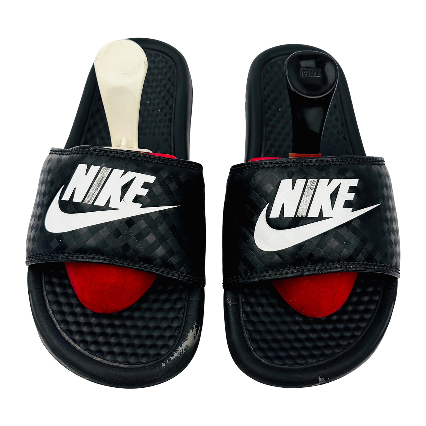 Black Nike Benassi JDI slides with red filling on a white background