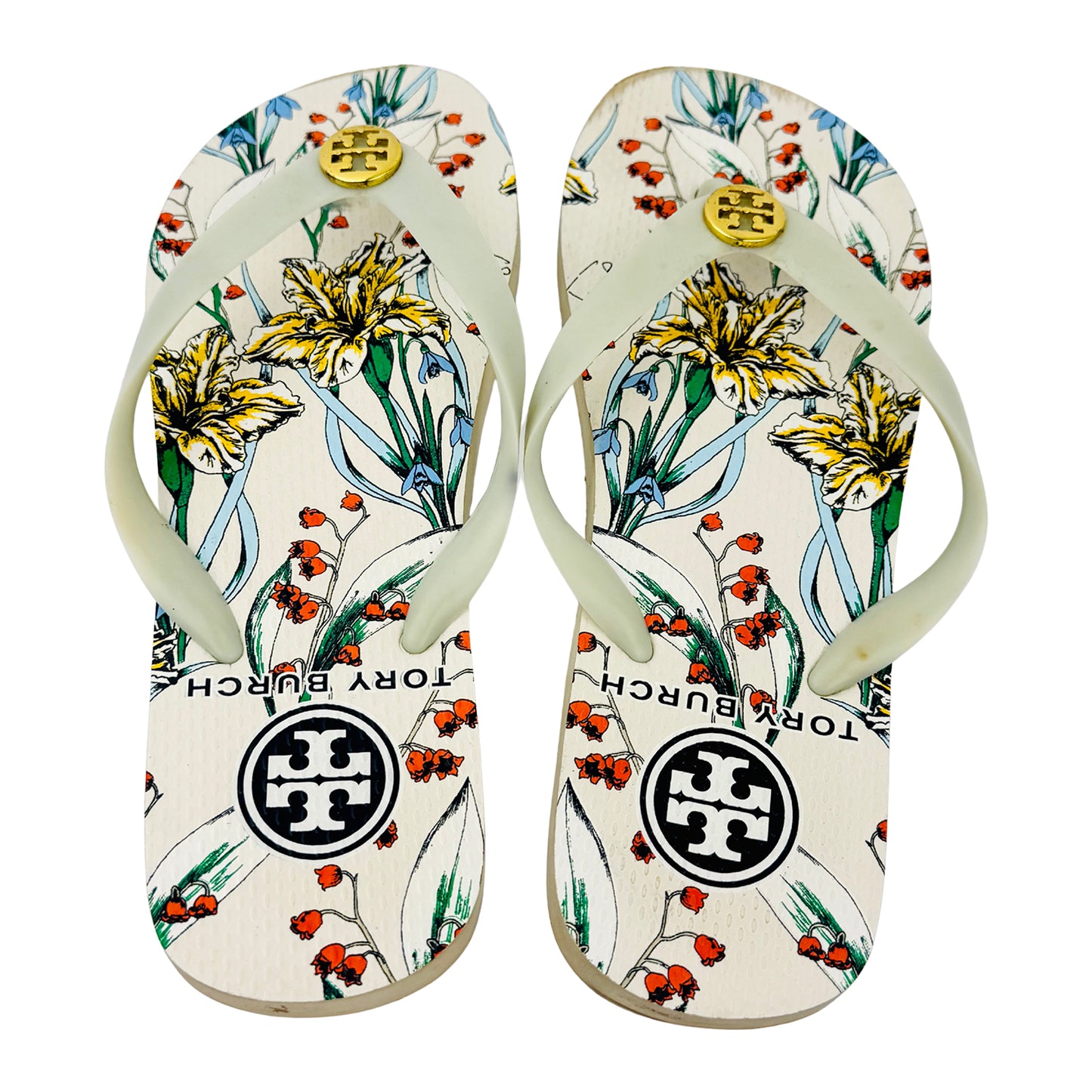 Floral patterned flip-flops with Tory Burch logo on a white background
