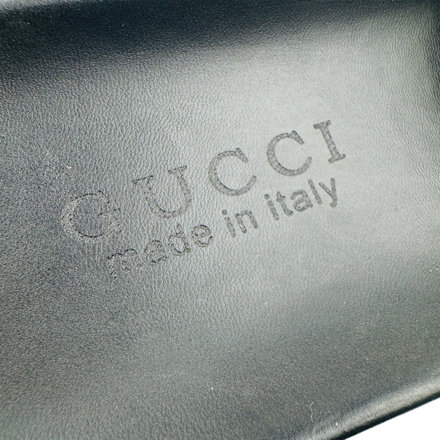Gucci Men's Logo Embossed Black Leather Slides (Size 42.5)