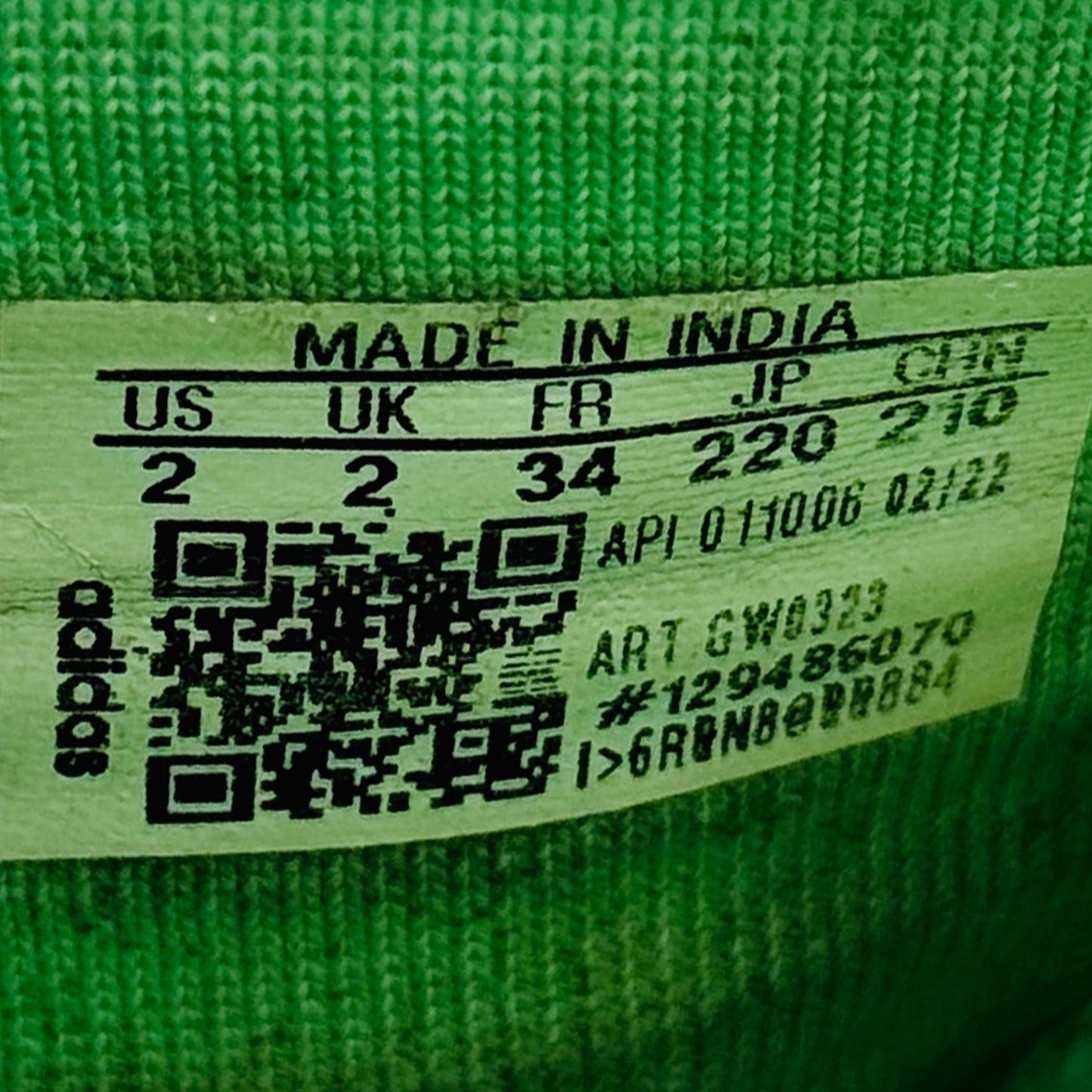 Adidas Adilette Shower Slippers Label with 'Made in India' text and size information and code GW0323