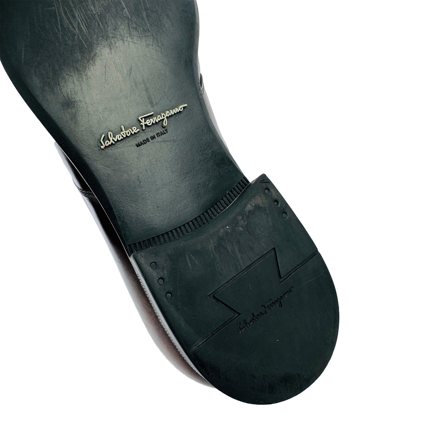 Outsole Brand Embossing Closeup image of Salvatore Ferragamo Men's Gancini Embossed Brown Loafers (Size 41.5/42)