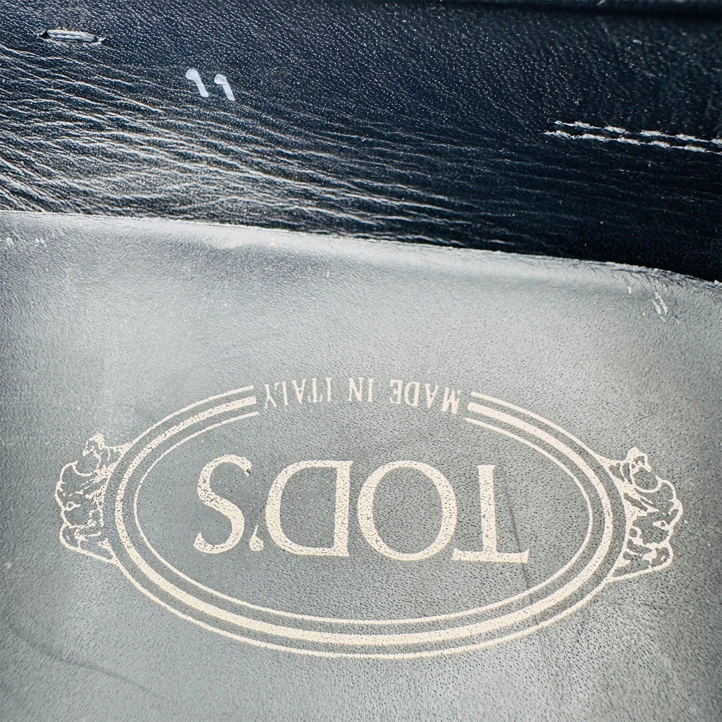 Inside Sole and Size Image of Tod's Men's Black Textured Leather Loafers (Size 45.5/46)