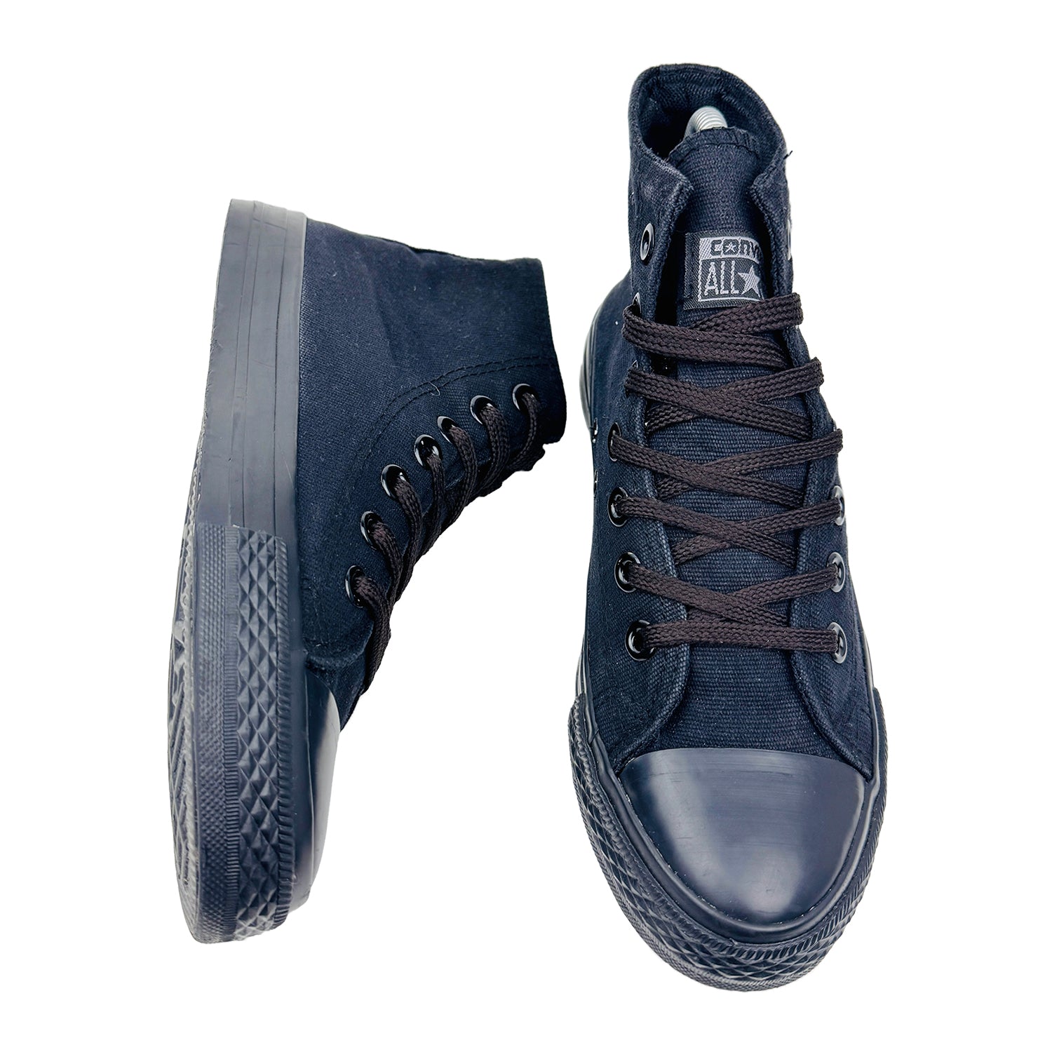 One shoe side and one shoe Front Image of Converse Chuck Taylor All Star Canvas Shoes (Size 38) 7l0803M25