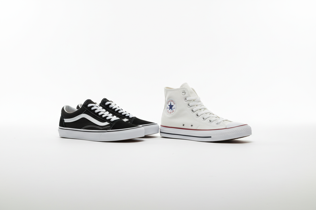  Vans and Converse sneakers placed side by side on a white surface in a clean studio editorial style