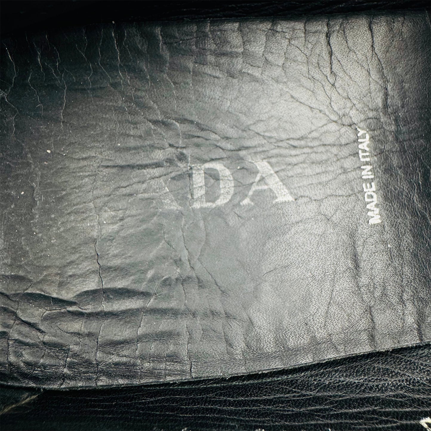 Prada Men's Black Grained Leather Loafers (Size 44)