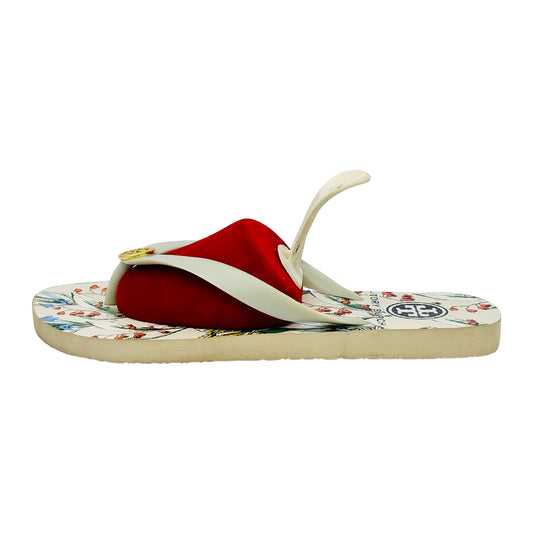 Tory Burch Flip-flop with floral pattern on a white background
