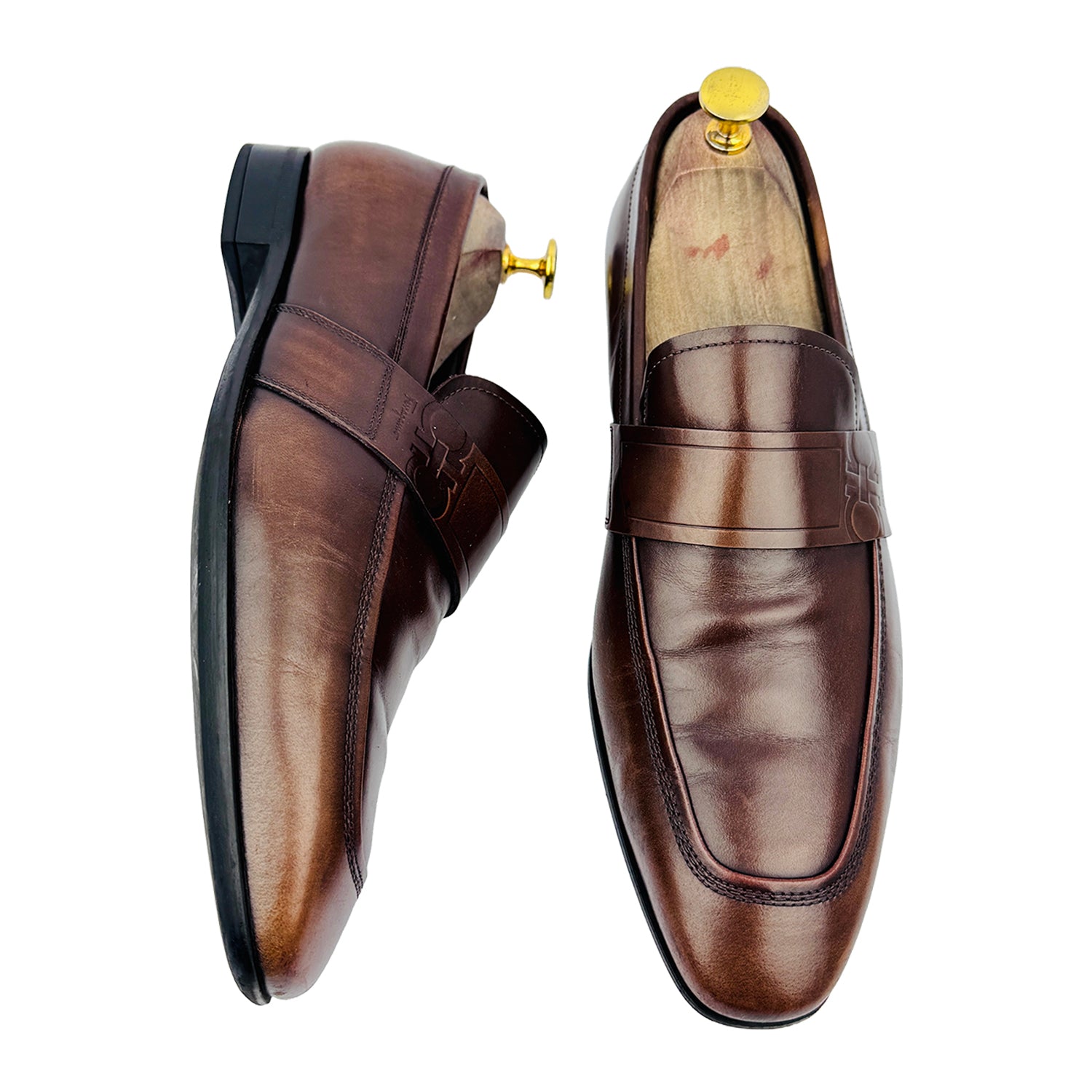 One Front One Cross image of Salvatore Ferragamo Men's Gancini Embossed Brown Loafers (Size 41.5/42)