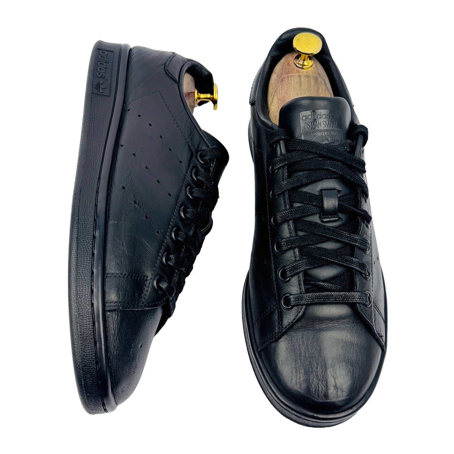 One Front One Cross image of Adidas Men's Stan Smith Black Sneakers (Size 42.5) - M20327
