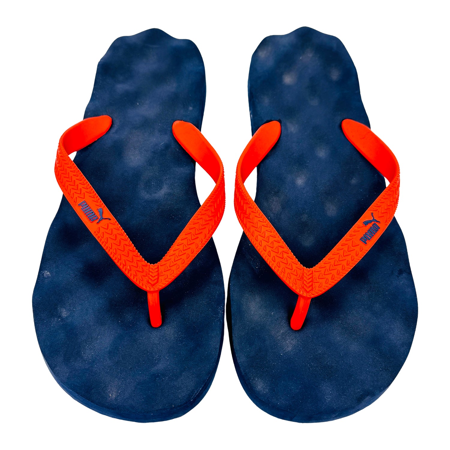 Pair of puma blue flip-flops with orange straps on a white background