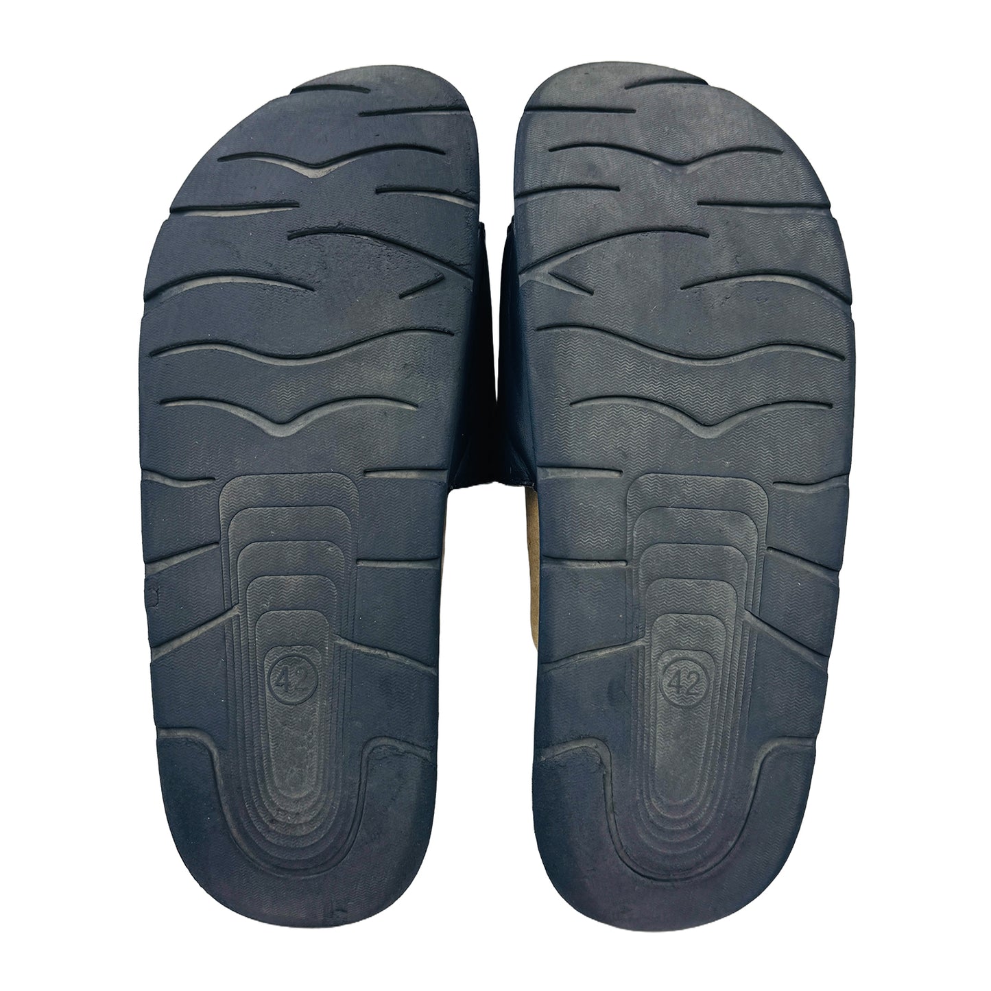 Rubber outsole of a Kappa slides on a white background