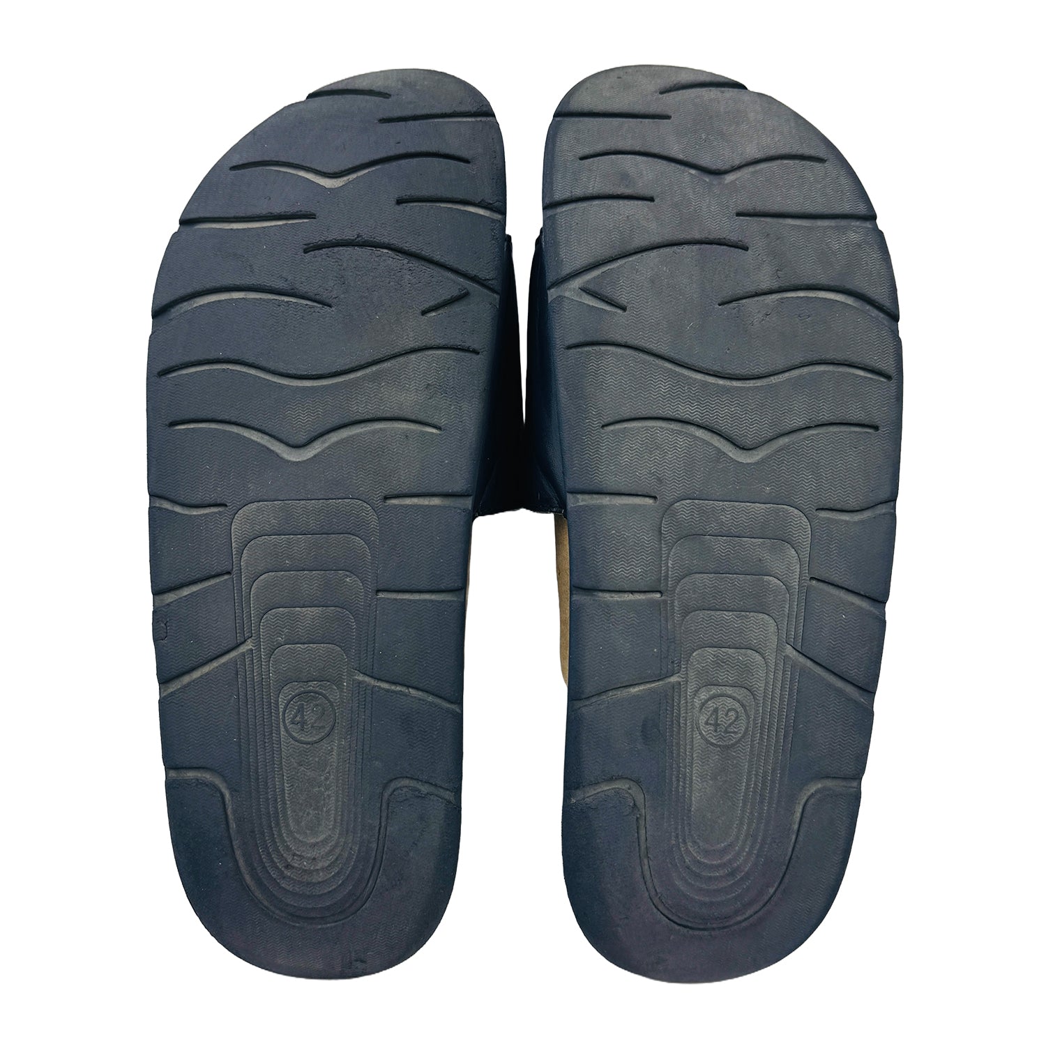 Rubber outsole of a Kappa slides on a white background