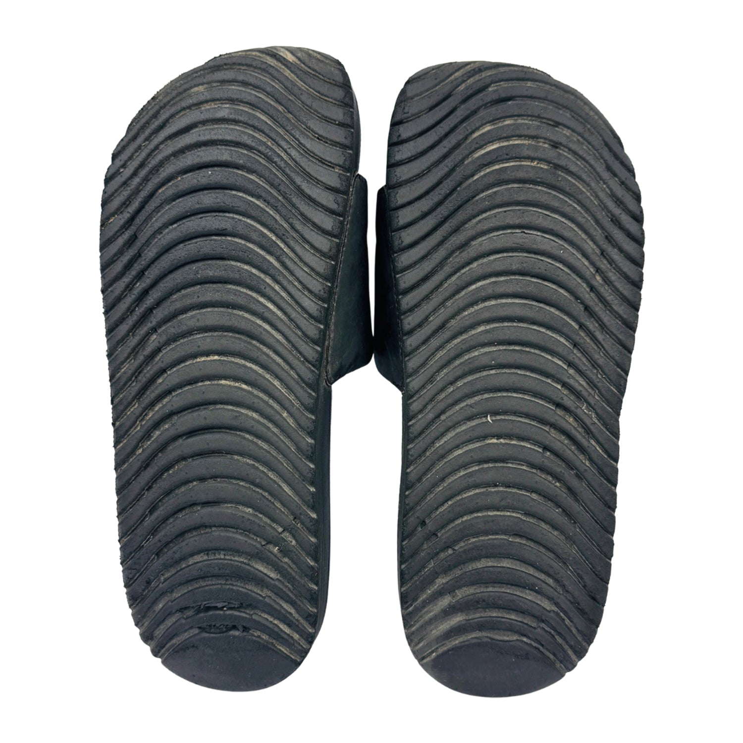 Outsole image of Nike Kawa Big Kid's Black Slippers (Size 37.5/38) - 819352-003