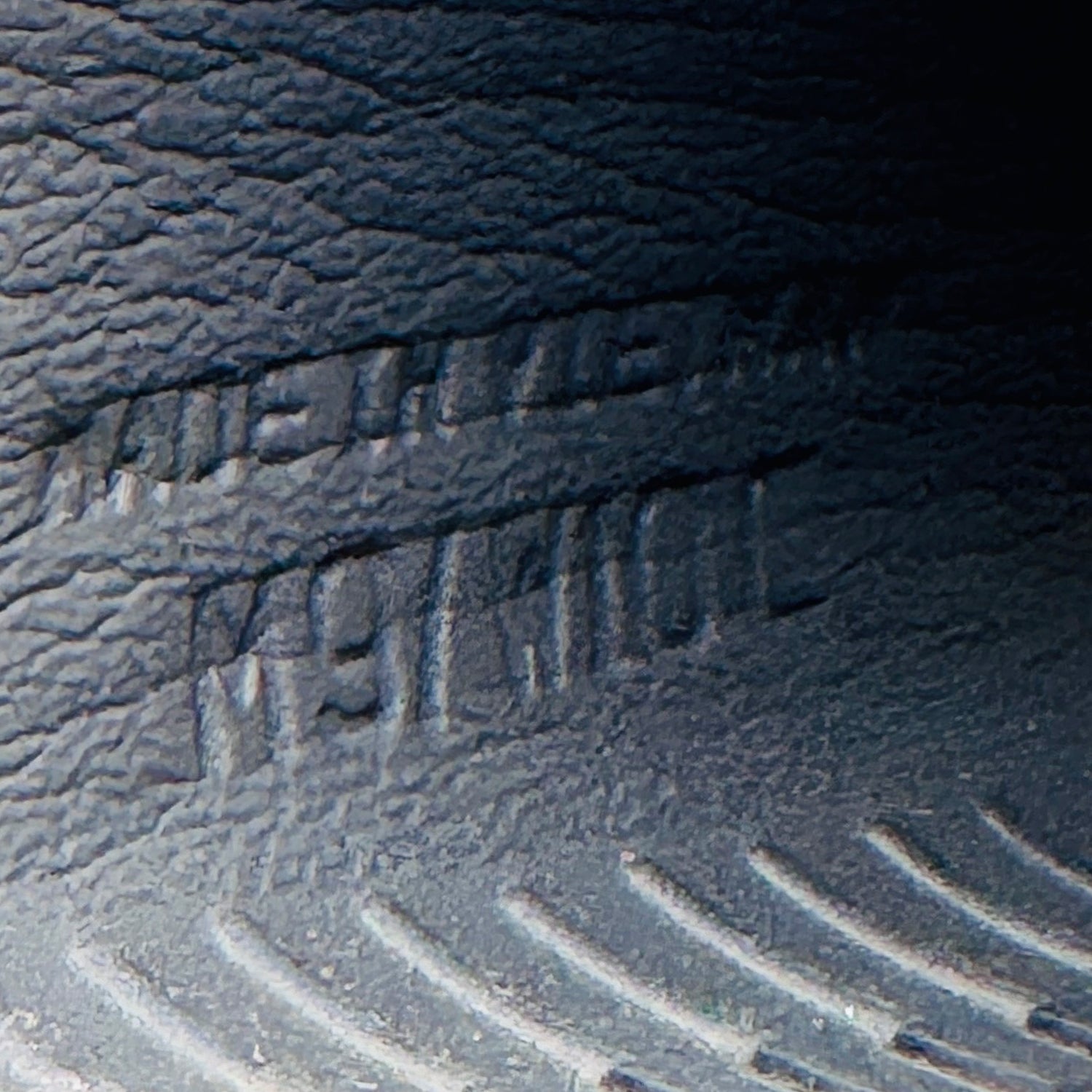 Inside Embossing image of Nike Men's Gray Kawa Slides