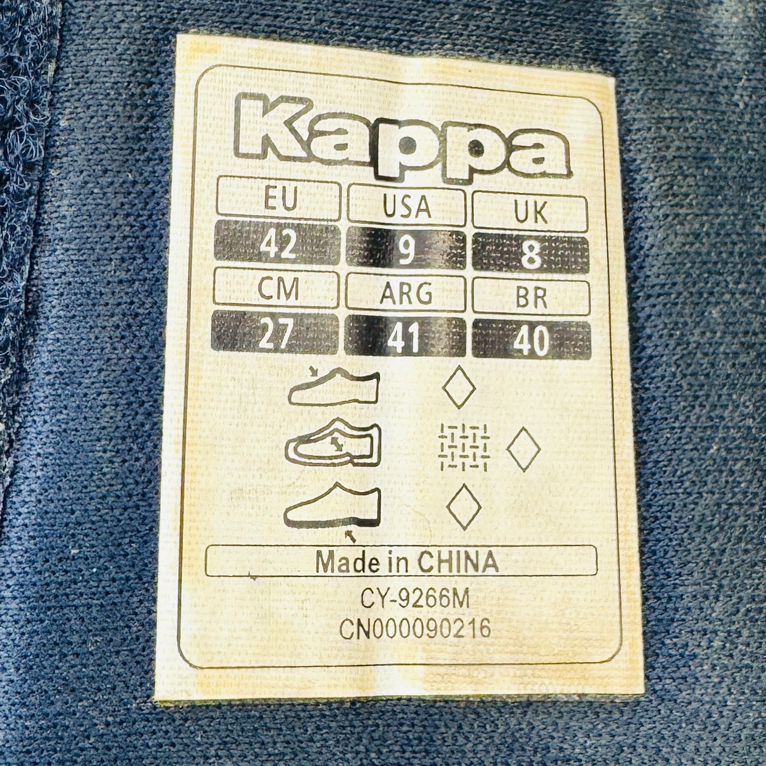 Kappa size label on a denim background