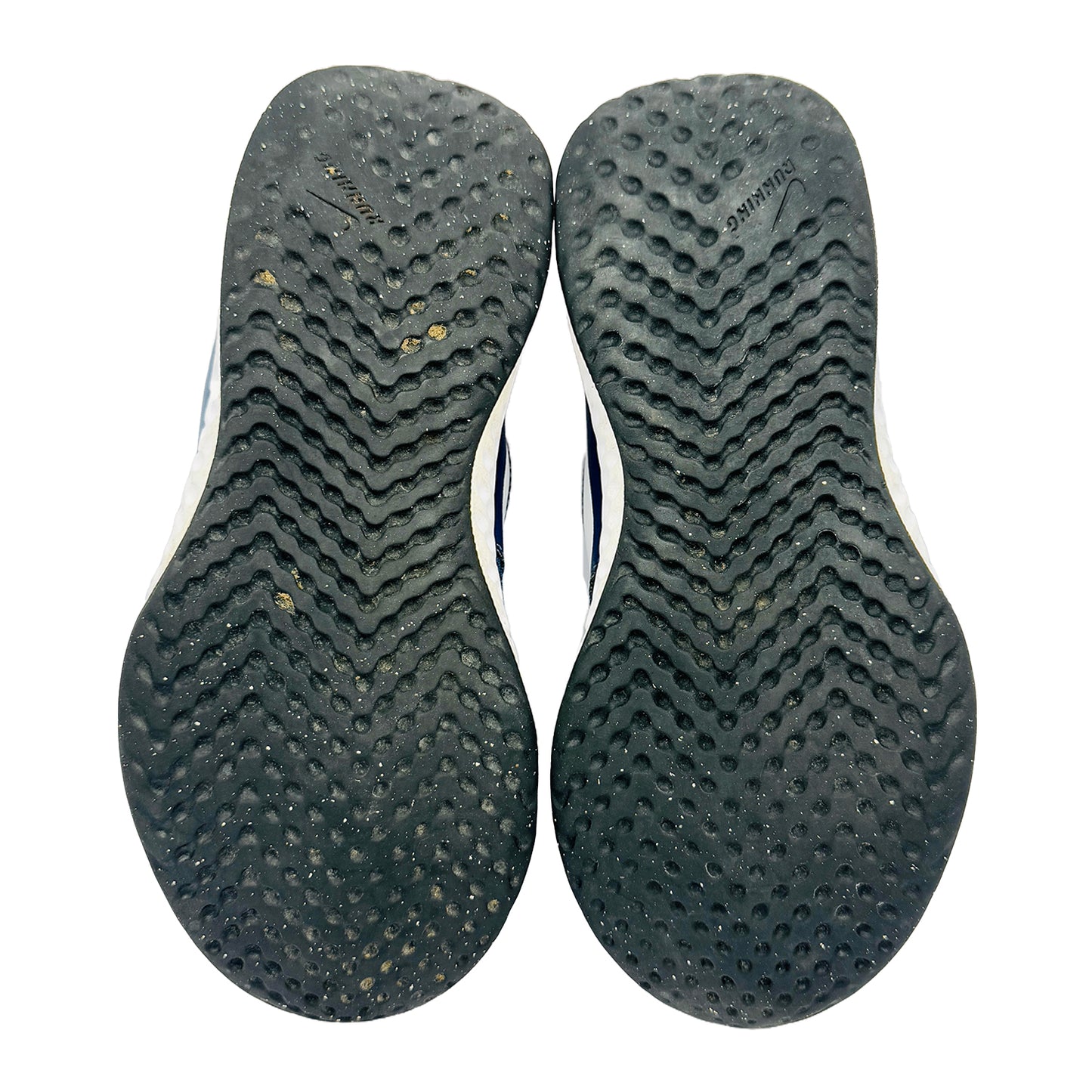 Outsole image of Nike Kid's Revolution 5 Shoes (Size 31) - BQ5672-410
